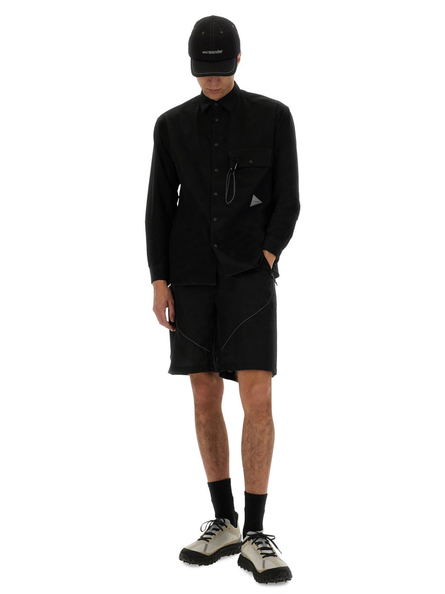 And Wander Nylon Shorts — Black