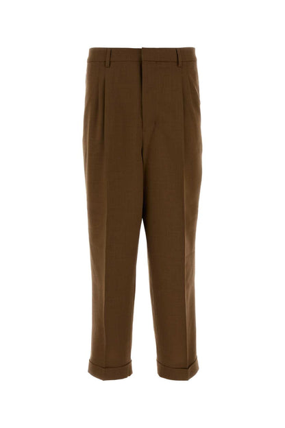 AMI Paris Carrot Trousers HTR111WV0066-216 men's trousers in Brown